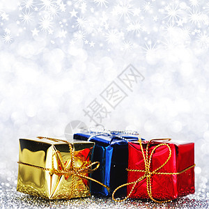 圣诞礼物 丝带 黄色的 金的 蓝色的 假期背景图片