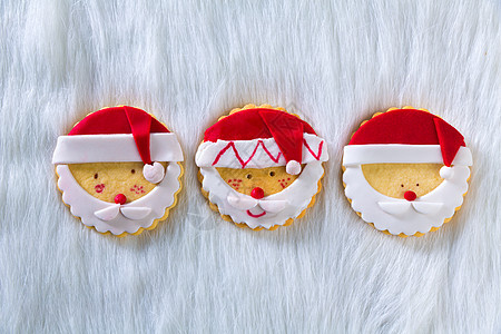 圣诞饼干 有圣塔脸白皮背景的圣诞饼 快乐的 美丽的图片