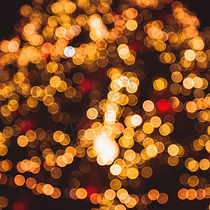 散焦的圣诞树 辉光 绿色的 火花 季节性的 概念上的 装饰的 金的图片