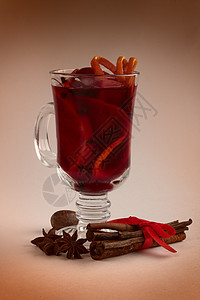 红味葡萄酒 丁香 烈酒 热酒 水果 假期 肉桂 温暖的背景图片