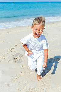 海滩上的男孩 日光浴 海滨 童年 休息 假期 旅行 水图片