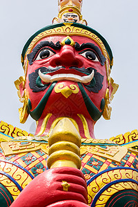 马来西亚泰国寺庙的红魔鬼守护神面孔背景图片