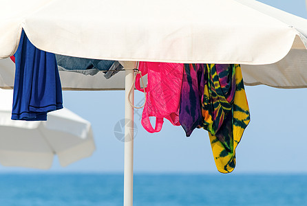 沙滩上的阳光和衣服 休息 闲暇 热烈地 旅行 洗澡图片
