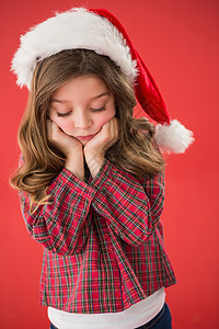 戴着圣塔帽子的可怜小女孩 噘嘴 伤心 圣诞节的时候 愁云图片