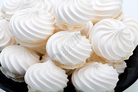 白色背景的法国香草蛋白饼干 糖 食物 蛋糕图片