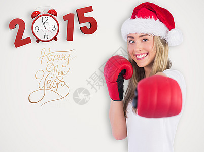 喜庆金发美女拳击拳手套的复合图像 庆祝 新年图片