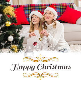 喜庆母亲和女儿装饰圣诞树的复合形象  爱图片