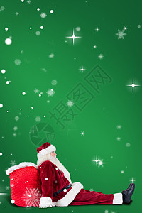 圣诞老人的复合图像坐在他的包袋上 喜庆 圣诞节的时候图片