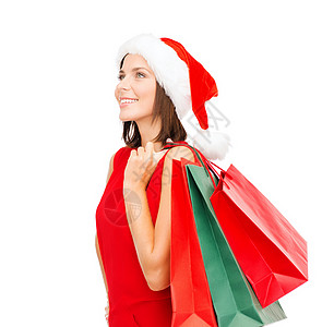 妇女穿着红色衣服 装着购物袋 包 顾客 奢华图片