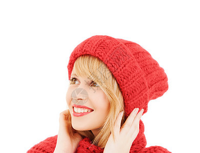 身着冬衣的年轻女子 帽子 福利 粉色的 可爱的 时尚 毛衣图片