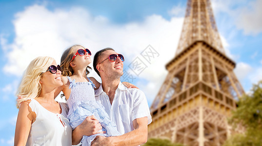 爱菲尔铁塔在爱菲尔塔背景的巴黎幸福家庭里背景