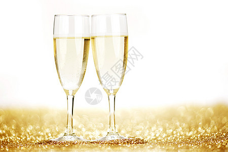 一对香槟笛 饮料 闪亮的 前夕 葡萄酒 闪光 假期 玻璃 金的图片