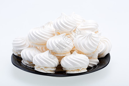 白色背景的法国香草蛋白饼干 酥皮 成形 糖图片