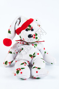 圣诞熊娃娃 红色的 帽子 玩具娃娃 假期 季节 节日 冬天背景图片