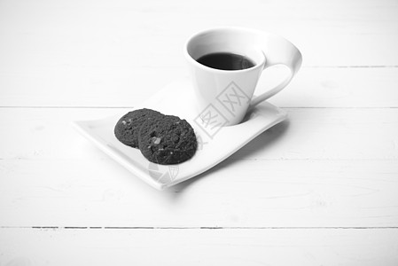 带有饼干黑白颜色的咖啡杯 卡布奇诺咖啡 食物 休息 甜的图片