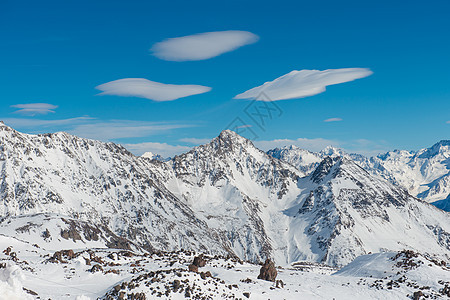 云中的蓝雪山 旅游 自然 高的 爬坡道 运动 冰川图片