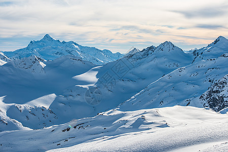 云中的蓝雪山 冰 高的 活动 滑雪 顶峰 高山 晴天图片