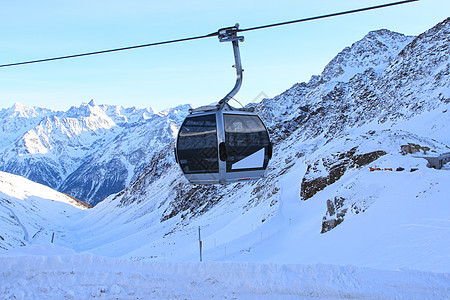 山地滑雪电梯 阿尔卑斯山 索道 运动 滑雪缆车 滑雪板 高的 舱图片