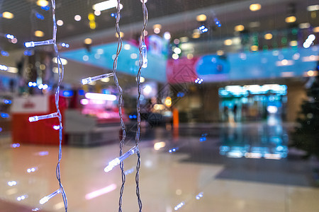 圣诞购物背景 精品店 中心 灯 魔法 购物中心 展示 装饰品图片