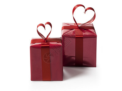 2个红色礼物盒 配有红光灯的红彩带弓图片
