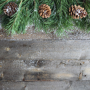 木制背景的圣诞卡 假期 装饰品 雪 潮人 桌子 新年图片