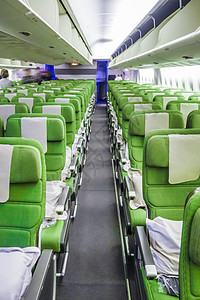 机舱的飞机座椅 航班 乘客 走道 游客 木板 到达 商业图片