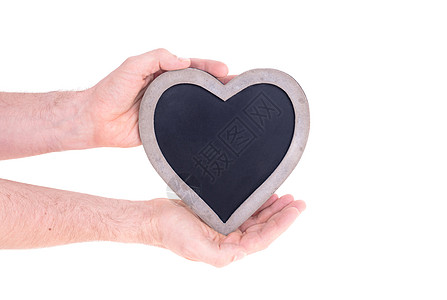 成人持有心脏的心形黑板 粉笔 成形 木头 木制的图片