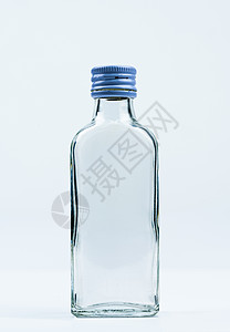 带封闭铝盖的空透明玻璃瓶隔离在白色背景上 带有空白标签和复制空间 用于饮料或医药产品设计模板 玻璃瓶包装图片