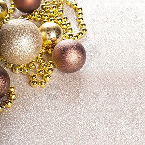 金色珍珠圣诞金色和棕色装饰品 圣诞舞会 喜庆的 圣诞节 问候语背景