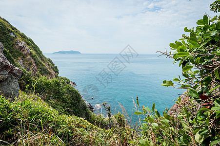 海滩和海与山丘的景观 美丽 旅游 商业 岩石 天空图片