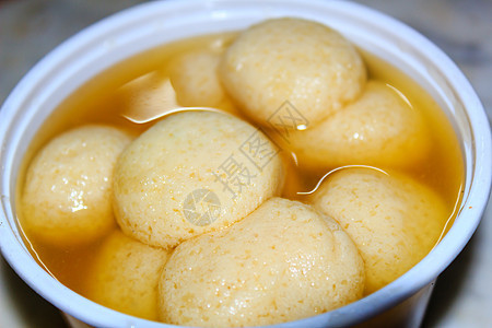 关闭一碗印度 Rasgulla 甜点 拉斯古拉印度甜食米泰 糖果 好吃图片