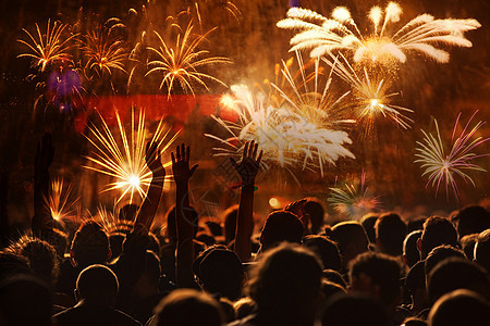 人群看烟花-新年庆祝活动-抽象假期 舞蹈家 前夕背景图片