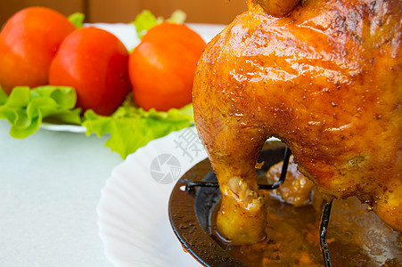 烤全鸡肉加西红柿和生菜的烤鸡 假期 苹果 油炸图片
