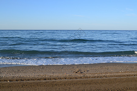 清晨海滩 旅行 地平线 海浪 自然 西班牙 太阳 假期 美丽的背景图片