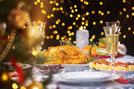 圣诞晚餐 饭厅 可口 灯 蔬菜 浆果 家庭 火图片