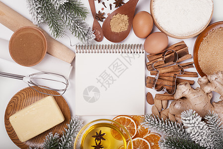 圣诞饼干烹饪背景 记事本 肉桂 冬天 橙子 烘烤 面粉图片