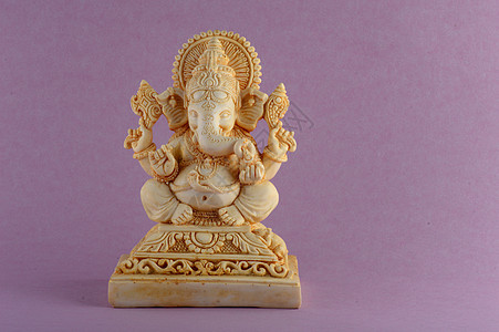 印度神象头神 紫色背景上的象头神偶像 亚洲图片