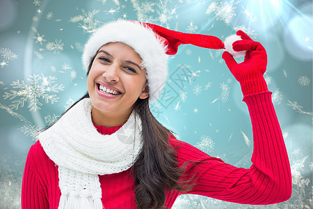 节日黑褐色的复合图像 冬天 圣诞帽 混血 女性 银图片
