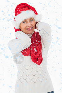 喜悦女性在镜头中微笑的复合形象 雪花 圣诞节的时候 休闲服装图片