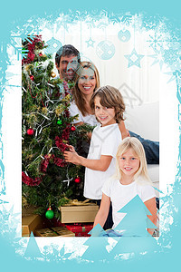 一个快乐的家庭 装饰圣诞树的肖像 女儿 男生图片