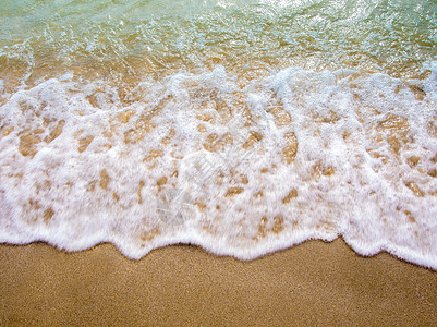 海浪在海滩上的白泡泡 气泡 夏天 自然 浪潮 热带背景图片