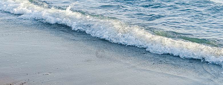 美丽的海浪或海浪 热带沙沙滩的海岸观视 暑假旅行和度假景点 地球 海岸线图片