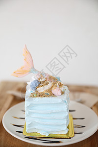 木本底的美人鱼蛋糕 蓝色的 派对 吃 甜点 糕点图片