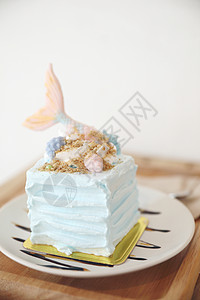 木本底的美人鱼蛋糕 刨冰 快乐的 结霜 蓝色的 派对图片