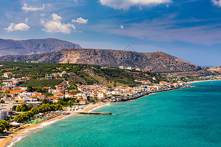 希腊的节日 美丽的卡利夫斯村 与绿海 镇图片