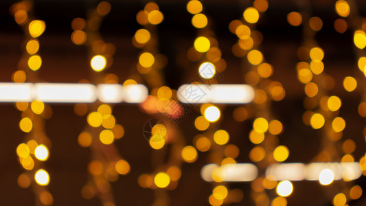 城市圣诞光照闪亮的明灯 金色布加 抽象背景 横横幅图片