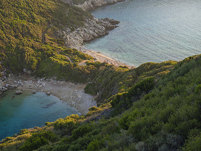 科孚 希腊 波多蒂莫尼 从路边的景点看阿菲奥纳斯最著名的双海滩和海湾 金色时光日 夏天 太阳图片