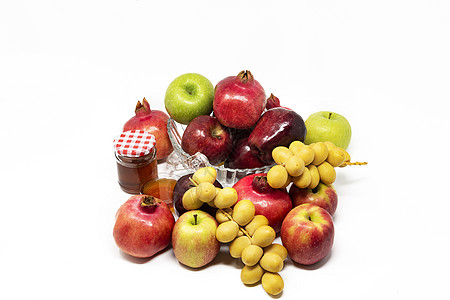 犹太新年 传统符号 玻璃罐中的蜂蜜 石榴 日期 红绿苹果 蔬菜 新鲜图片