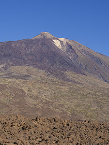 特纳里夫金丝雀岛最高峰的西班牙山 其蓝色天空背景为垂直直线 在南端和西伯利亚图片