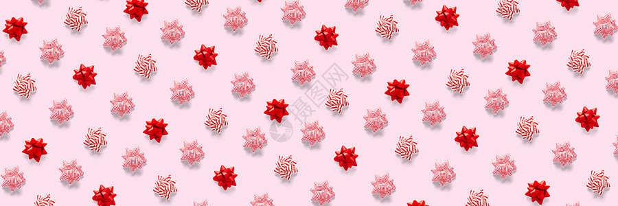 粉红色背景上的现代圣诞背景 圣诞节时的创意平躺 横幅 海报 印刷品和其他创意作品 植物 新年图片
